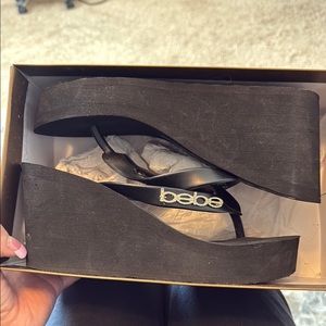 Bebe Black Sleek Platform Sandals